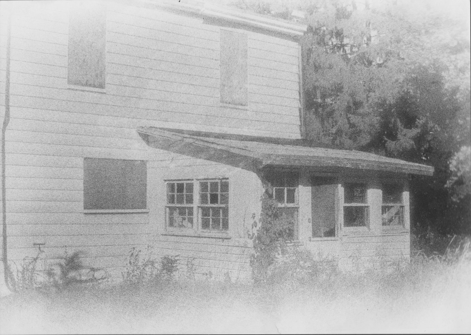 35mm darkroom photograph of a house